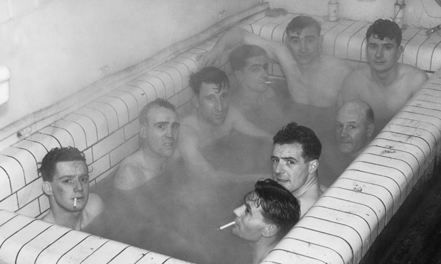 Ipswich Town football players having a bath after the replay of their third round FA Cup
