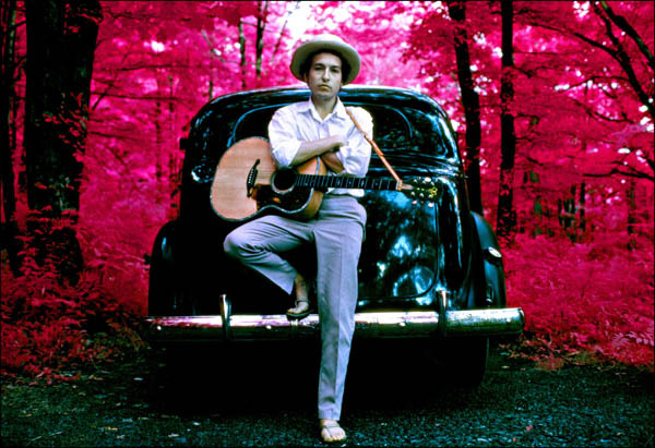 Bob Dylan, outside his Byrdcliffe home, infrared color film, Woodstock, NY, 1968. Photo By ©Elliott Landy, LandyVision Inc.